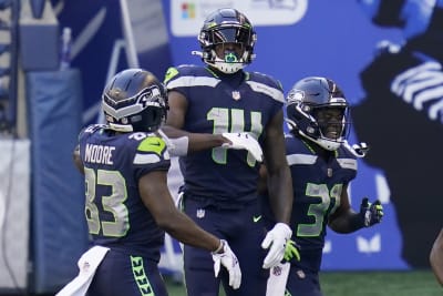 Big days from Wilson, Metcalf lead Seahawks past 49ers 37-27
