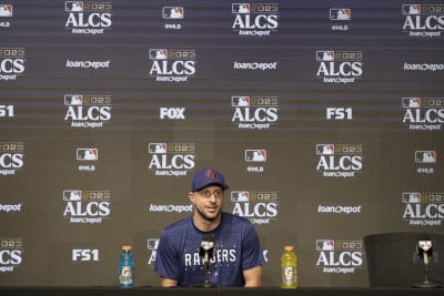 Max Scherzer returns to Rangers after a month away