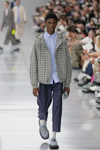 A model wears a creation of Louis Vuitton Men's fashion Spring