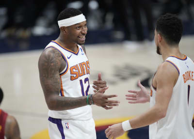 LeBron James congratulated Devin Booker post-game with a signed