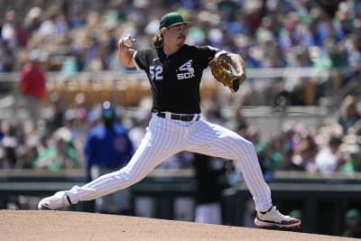 Cardinals reliever Gallegos gets wiped down by umpire after using rosin bag  on his left arm