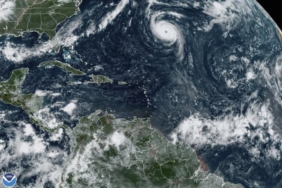 Hurricane Lee Swirls Through Open Waters On A Path To Atlantic