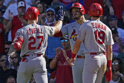 Cards match record with 14th straight win, rip Cubs 12-4