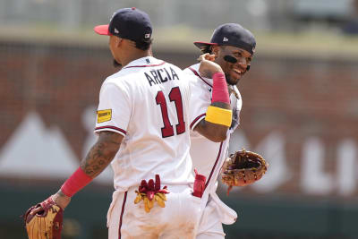 Austin Riley of the Atlanta Braves celebrates with teammates after