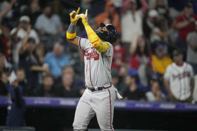 Multiple Fans Rush Field and Make Contact With Braves' Ronald