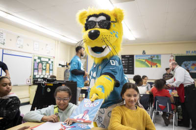 Jaguars make surprise visit to Lone Star Elementary School on Giving Tuesday