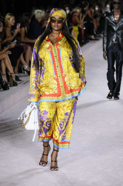 A model walks the runway at the Prada show during Milan Men's