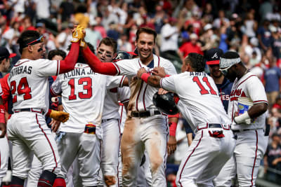 Austin Riley of the Atlanta Braves is congratulated by Matt Olson