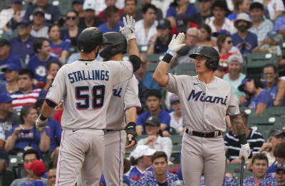 Peyton Burdick of the Miami Marlins in the dugout against the