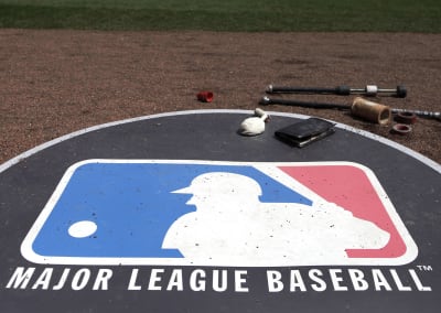 Cardinals reliever Gallegos gets wiped down by umpire after using rosin bag  on his left arm