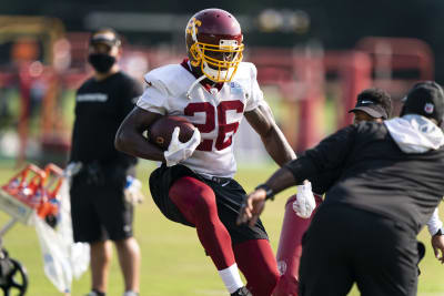 Washington releases Adrian Peterson, turns to young backs