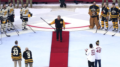 NHL's Winter Classic: Bruins and Penguins players don Red Sox and