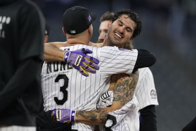 Fuentes, Rockies split doubleheader with virus-short Padres