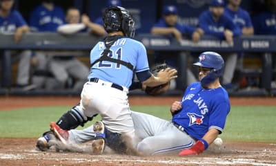 Whit Merrifield of the Toronto Blue Jays poses for a photo with