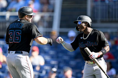 Miami Marlins' Jake Burger celebrates his home run during the