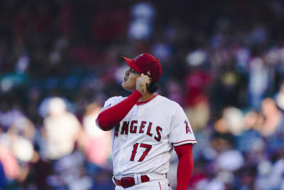 Los Angeles Angels' Shohei Ohtani (17) walks off the field after