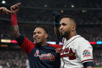 Eddie Rosario of the Atlanta Braves celebrates after hitting a