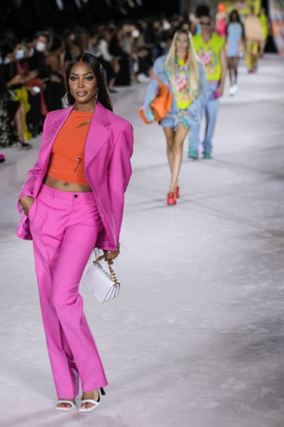 Dua Lipa walks the Versace runway, Prada resists normality