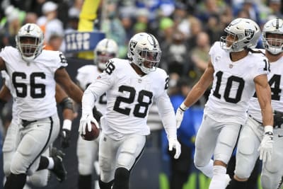 Jacobs caps huge day with TD in OT, Raiders beat Seahawks