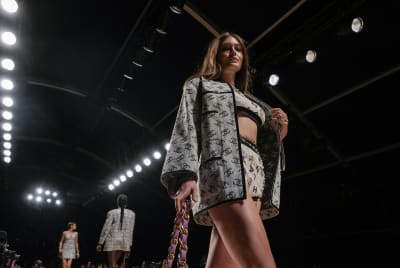 A model wears a creation for the Chanel Spring-Summer 2022 ready-to-wear  fashion show presented in Paris, Tuesday, Oct. 5, 2021. (Photo by Vianney  Le Caer/Invision/AP Stock Photo - Alamy