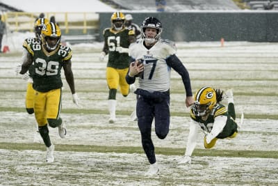 Green Bay Packers vs Tennessee Titans game photos at Lambeau Field