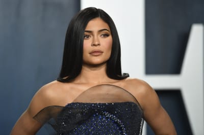 Kylie Jenner shows off her toned stomach as she in Chanel crop top in  series of throwback posts