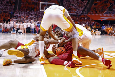 Zeigler, No. 13 Tennessee hold off No. 14 Arkansas