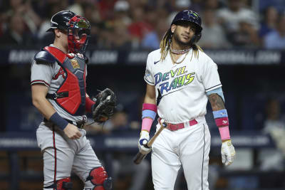 Majors-leading Braves beat the Rays 2-1 in a matchup of teams with