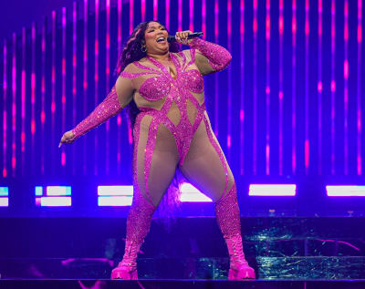 Lizzo wears revealing glittery red bodysuit on stage as tour reaches  Indianapolis