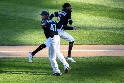 Chicago White Sox's Billy Hamilton (0) and Tim Anderson (7