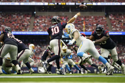 Ekeler scores 3 touchdowns, Chargers hold off Texans 34-24