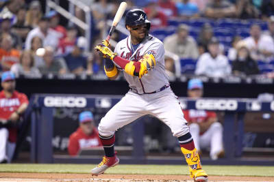 ATLANTA, GA - JULY 12: Atlanta Braves right fielder Ronald Acuna Jr. (13)  flips his bat after drawing a walk during an MLB game against the New York  Mets on July 12