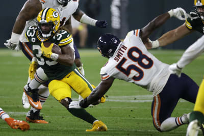 Rodgers, Packers lean on Jones, take care of Bears 27-10