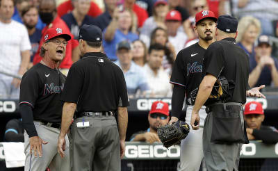 ADDS THE UMPIRES NAME - First base umpire reacts after Atlanta