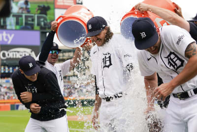 Detroit Tigers' Matt Vierling slides home after tagging on fly