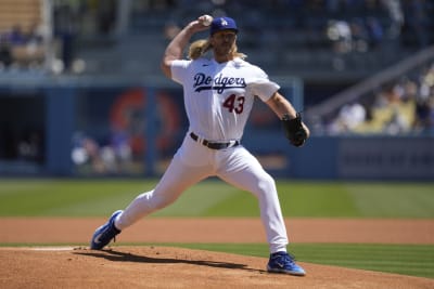 New York Mets starting pitcher Max Scherzer tosses the ball up