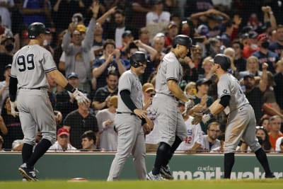 Atlanta, USA. 23rd Aug, 2021. New York Yankees Brett Gardner (from left), Joey  Gallo, and Aaron Judge celebrate a 5-1 victory over the Atlanta Braves in a  MLB baseball game on Monday