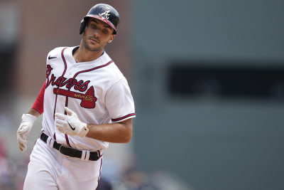 ST. LOUIS, MO - APRIL 05: Atlanta Braves first baseman Matt Olsen (28) is  congratulated bye teammates in the second inning after scoring on a solo  home run during an MLB game