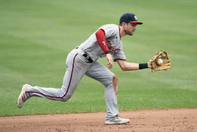 Washington Nationals' Trea Turner continues his slide as he scores during  the fifth inning of a baseball game against the Cincinnati Reds, Saturday,  June 24, 2017, in Washington. (AP Photo/Nick Wass Stock