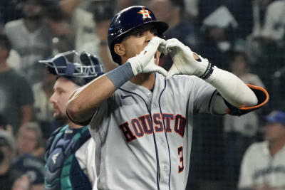 Houston Astros first base coach Jose Cruz checks his hair as he comes off  the field in the third inning against the St. Louis Cardinals at Busch  Stadium in St. Louis on