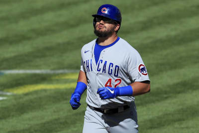 Chicago Cubs' Kyle Schwarber celebrates at home plate after