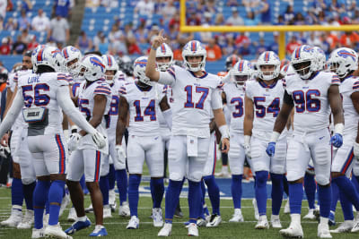 Josh Allen throws 4 TD passes, runs for score, Bills rout division