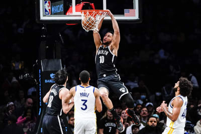 The shoes of Memphis Grizzlies guard Ja Morant are shown as he plays  against the Dallas Mavericks in an NBA basketball game in Dallas, Sunday,  Jan. 23, 2022. (AP Photo/Tony Gutierrez Stock