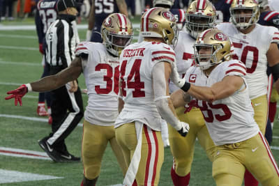 Wilson has 3 TDs before injury, 49ers crush Patriots 33-6