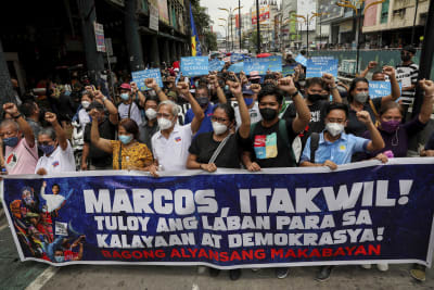 Marcos takes helm in Philippines, silent on father's abuses - Los Angeles  Times