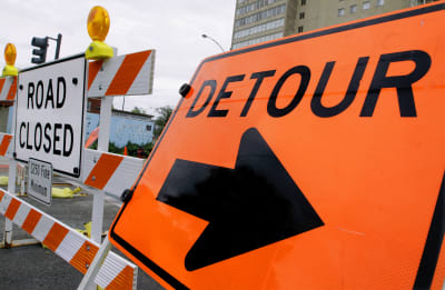 Massive sign knocked down by wind closes I-95 highway and IKEA in