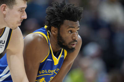 Golden State Warriors forward Andrew Wiggins (22) dunks against the Utah  Jazz during the second half of an NBA basketball game in San Francisco,  Sunday, March 14, 2021. (AP Photo/Jeff Chiu Stock