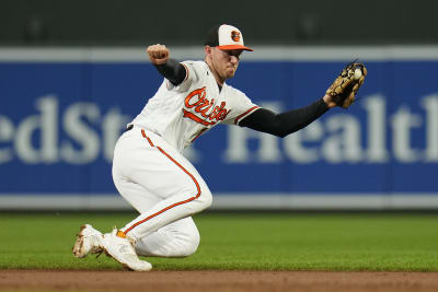 The clock atop the scoreboard at Oriole Park at Camden Yards is visible in  the first inning of a baseball game between the Baltimore Orioles and the  Boston Red Sox, Wednesday, April