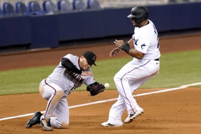 Duvall drives in 4, Marlins roll past Diamondbacks 8-0