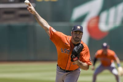 Brown drives in four runs to help A's rally past Astros 8-5